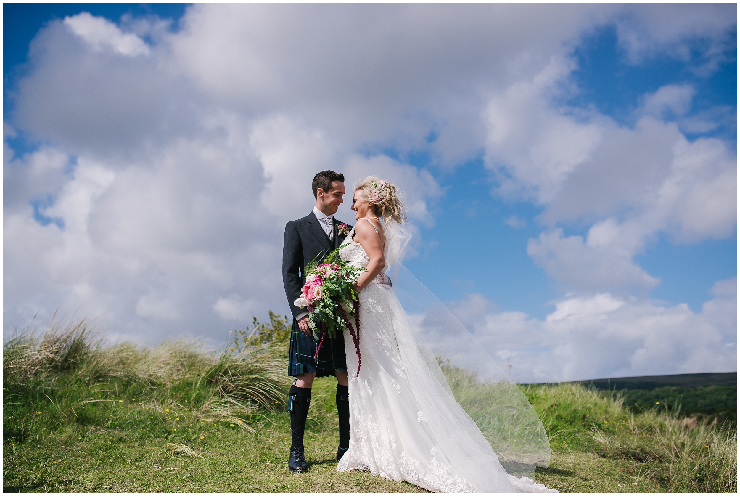 bride and groom at oxwich bay beach