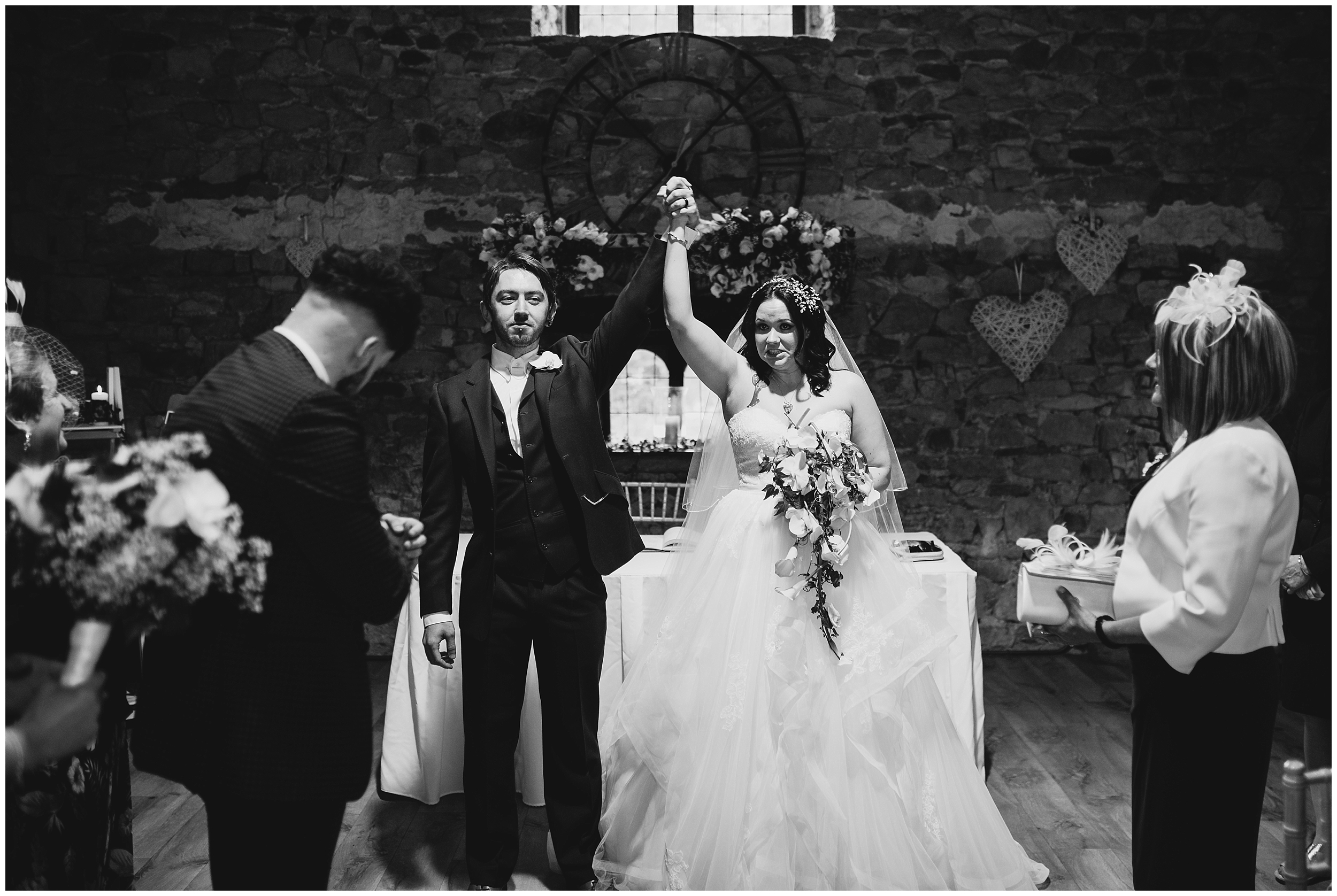 bride and groom celebrating at Pencoed house